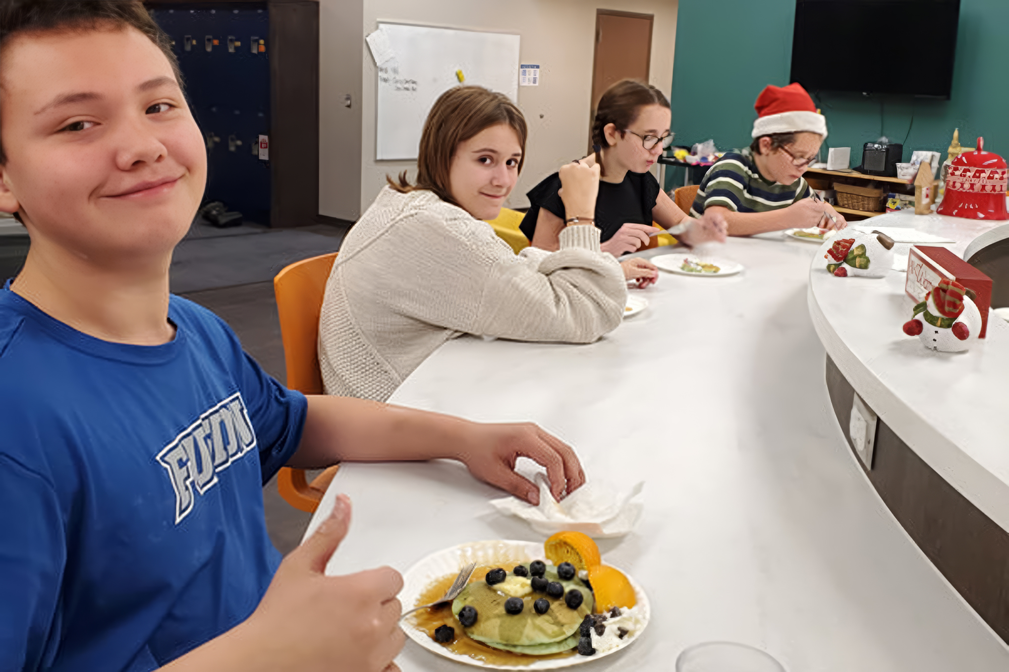 kids eating breakfast at a counter