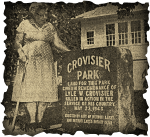 Bernice Crovisier next to Crovisier Park sign