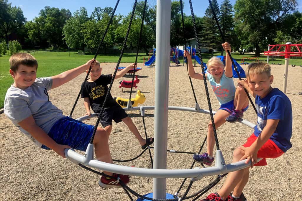 smiling kids on a playground