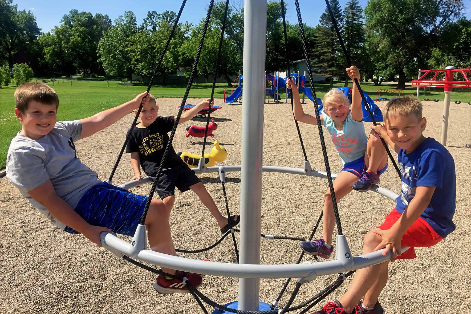 smiling kids on a playground